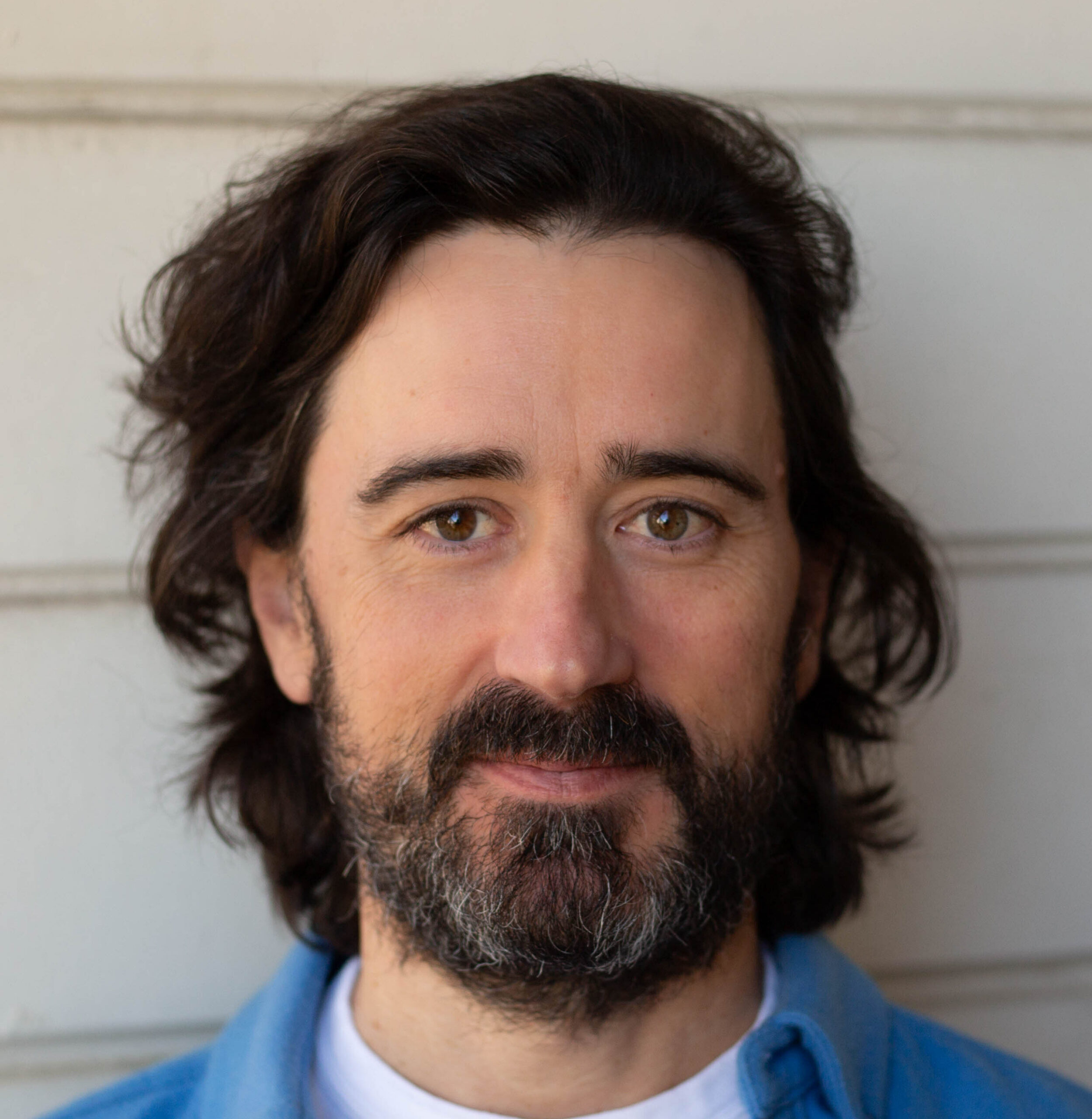 author photo of Scott Hutchins in blue shirt